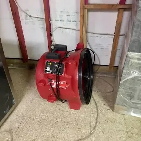 Drying equipment in a room with wet materials removed, typical of what a Malibu property can need